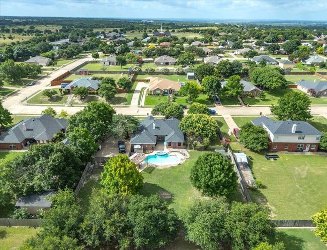 Aerial perspective of suburban area with a pool area | Image 28