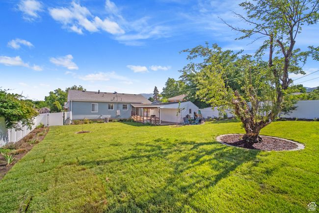 View of yard featuring a sunroom | Image 26