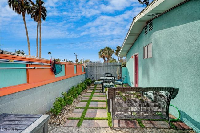 View of yard featuring a patio and fence | Image 36