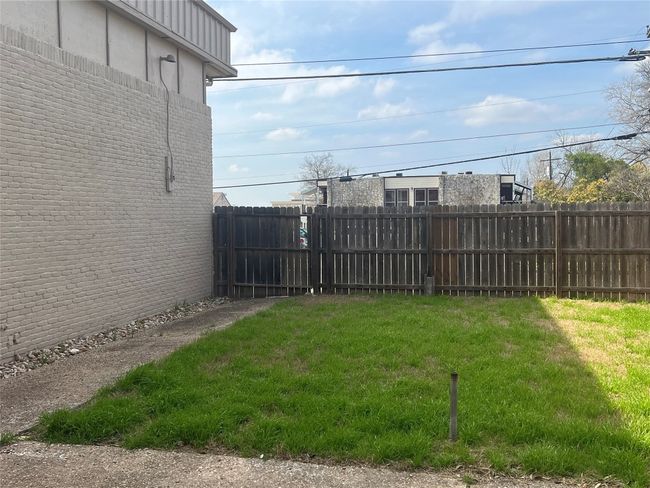 View of yard featuring fence | Image 17