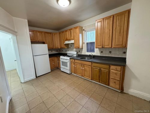 2724 Gillmore St, East Elmhurst, NY, 11369-1902 | Card Image