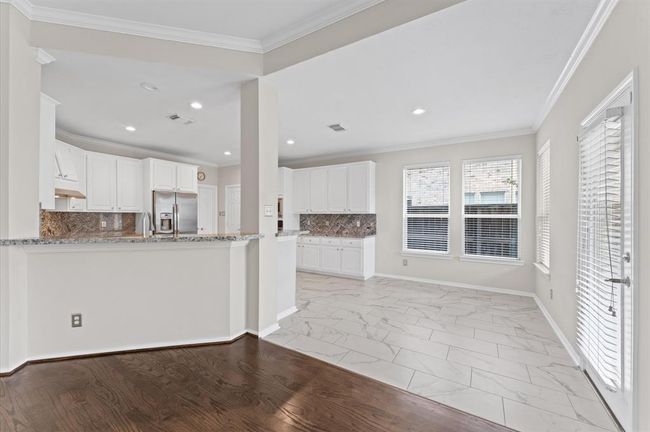 Nice kitchen open layout concept creates a seamless and modern living environment, that covers all kitchen needs. | Image 14