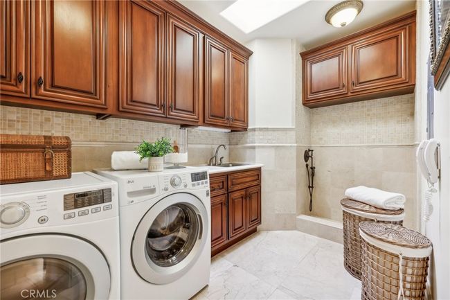 Second Floor Laundry Room with pet shower. | Image 53