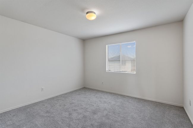 Empty room featuring carpet floors and baseboards | Image 21