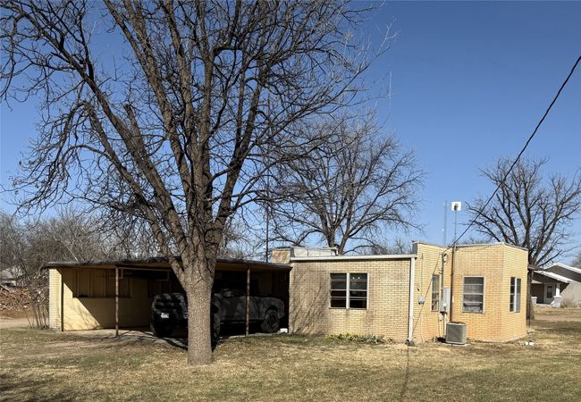 Back of house with carport and over 50-year-old pecan tree still producing! | Image 8