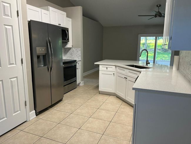 912 Park Valley Cir, House other with 4 bedrooms, 2 bathrooms and null parking in MINNEOLA FL | Image 5