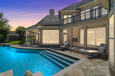 Distinctive architectural pool complements the design of the home to create a unified look. | Image 3