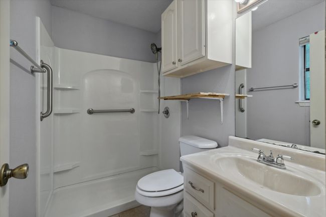 Full bath featuring a shower and vanity | Image 9