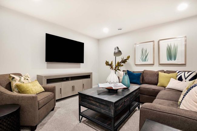 TV area of lower level family room. | Image 21