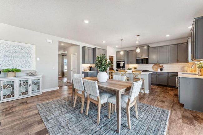 There's even ample space for additional furniture, be it buffet or bookshelves. Photo of model home, colors and finishes will vary. | Image 13