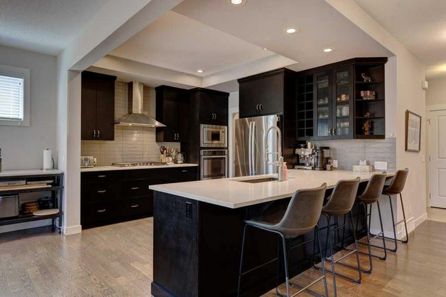 110 Drake Landing Terr, House other with 3 bedrooms, 3 bathrooms and 3 parking in Okotoks AB | Image 4