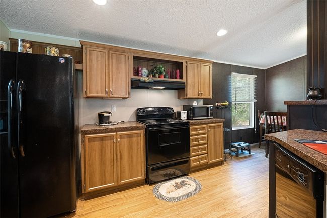 1231 Peach Creek Rd, House other with 4 bedrooms, 2 bathrooms and null parking in Waelder TX | Image 14