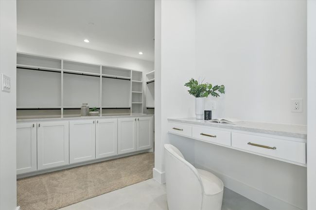 View of walk in closet | Image 21