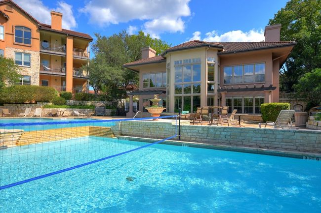 Community pool featuring a patio area | Image 19