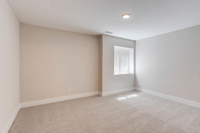 Unfurnished room with light carpet and baseboards | Image 25