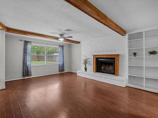 Filled with natural sunlight and featuring Extra Built ins | Image 4