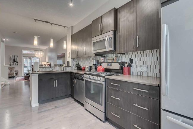 311 Ascot Circle Sw, Home with 2 bedrooms, 1 bathrooms and 2 parking in Calgary AB | Image 7