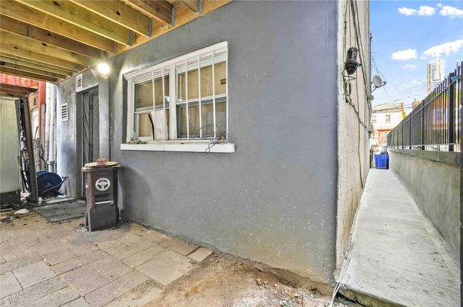 View of home's exterior featuring stucco siding and fence | Image 23