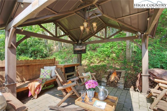 Seller added this gazebo area with fire pit. | Image 40