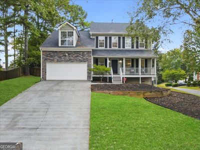 5013 Wesleyan Drive, House other with 4 bedrooms, 2 bathrooms and 2 parking in Woodstock GA | Image 1