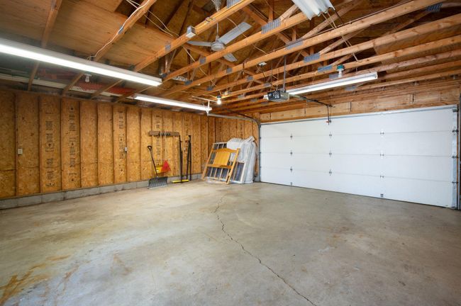 Oversized 2.5 car garage with high ceilings perfect for workshop and/or storage | Image 25