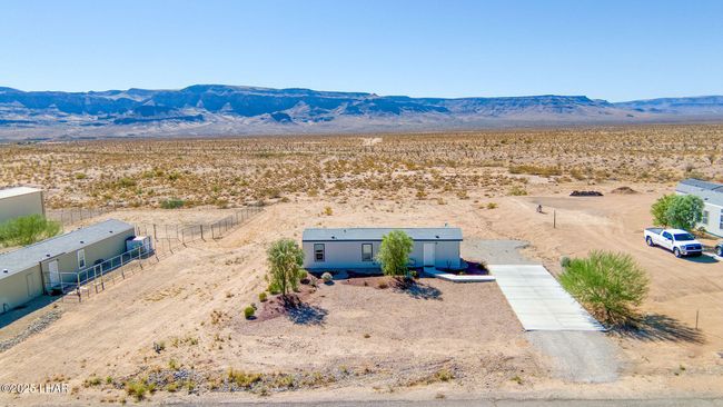 10747 Paradise Trails Rd, House other with 2 bedrooms, 1 bathrooms and null parking in Yucca AZ | Image 30