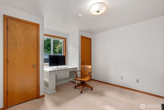 Main floor office with two closets | Image 13