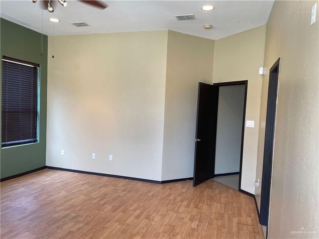 Spare room with light wood-style floors, ceiling fan, baseboards, and recessed lighting | Image 12