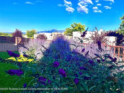 Get ready to relax and savor the cool summer days while soaking in the stunning view of Sierra Blanca from the back gated courtyard! | Image 2