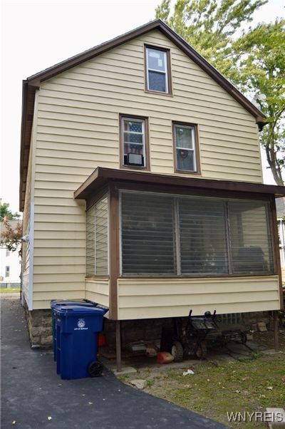 downstair apartment with sunroom. | Image 3