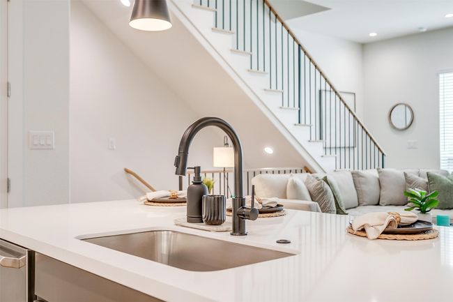 Room details with light countertops, recessed lighting, and a sink | Image 12