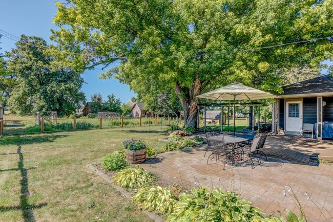 Gorgeous paver patio with fire pit. Perfect for those summer nights! | Image 19