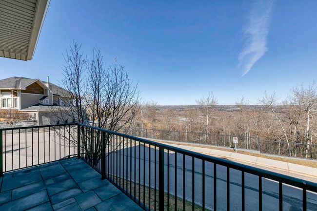 75 Cougar Ridge Landing Sw, Home with 3 bedrooms, 2 bathrooms and 2 parking in Calgary AB | Image 17