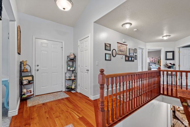 Entryway featuring light wood finished floors and baseboards | Image 20
