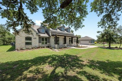 Beautiful and valuable shade trees dominate the three acre lot. Sellers spent $12k on all-new landscaping the week before listing! | Image 1