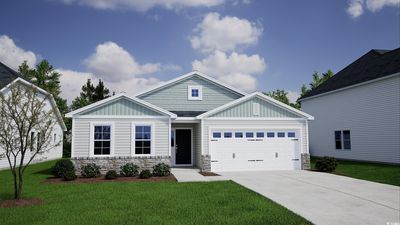 Craftsman house featuring a garage and a front lawn | Image 1