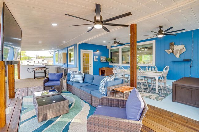 Living area featuring wood ceiling, a ceiling fan, wood finished floors, and recessed lighting | Image 4