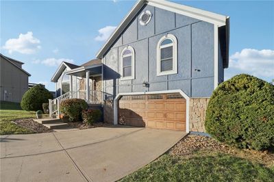 View of front of house with a garage | Image 2