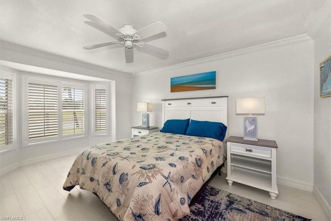 Bedroom featuring ornamental molding and ceiling fan | Image 16
