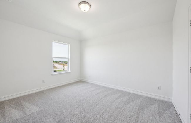 Spacious secondary bedroom features ample closet space *Real home pictured | Image 16