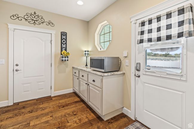 Entrance foyer featuring dark hardwood / wood-style flooring | Image 42