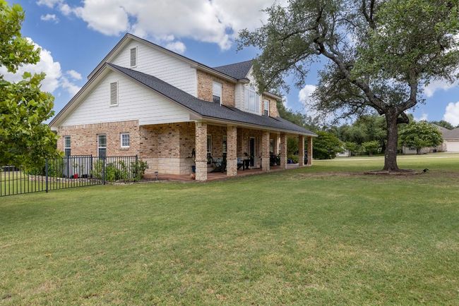 Lovely front and back covered porches. | Image 5