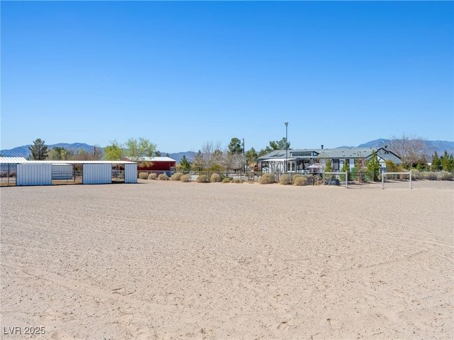 View of yard featuring an outdoor structure and a mountain view | Image 66