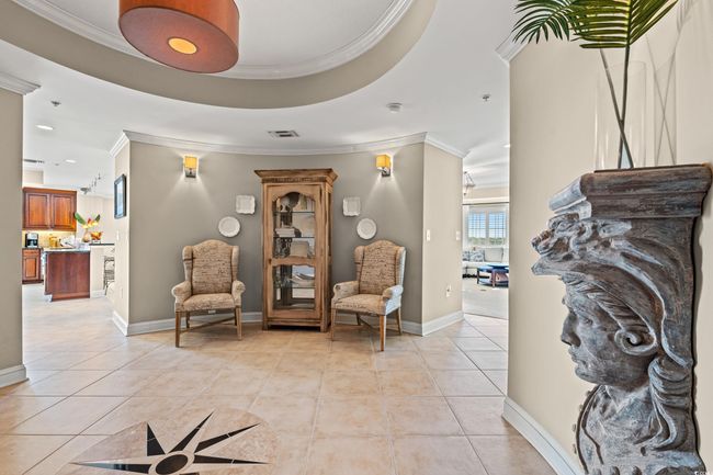 Entryway featuring light tile patterned floors, crown molding, and recessed lighting | Image 4