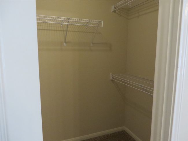 View of walk in closet | Image 12