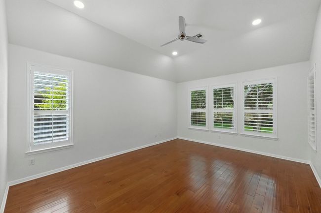Windows on 3 walls, simple shutters that split so you can open the top or bottom of window or both. overlooks perfectly manicured shaded backyard with 100% privacy with stone wall. | Image 19