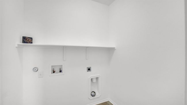 Laundry area with hookup for a washing machine, hookup for a gas dryer, laundry area, and hookup for an electric dryer | Image 19