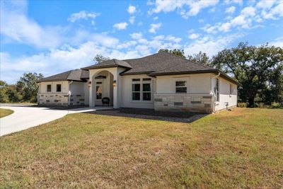 A gorgeous exterior kept in pristine condition by full gutters. | Image 2