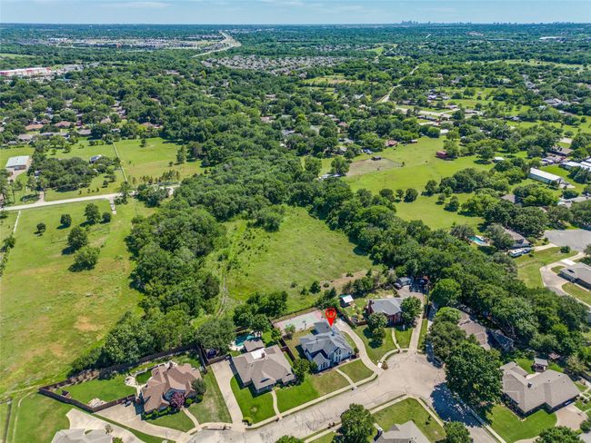 Aerial overview of property's location with nearby suburban area | Image 26