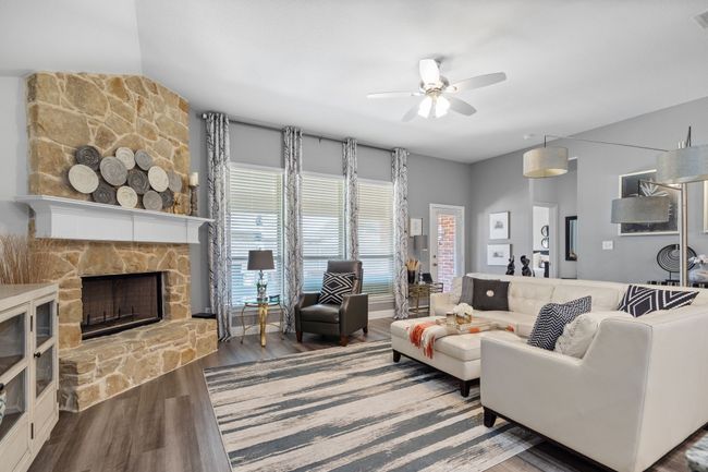 Light-filled open living area with contemporary updates and tasteful designer accents! | Image 15